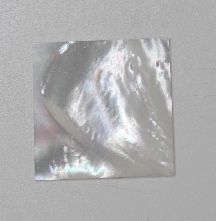 <p>White Mother of Pearl flat inlay blanks size 40mm (1.57") width x 40mm (1.57") length x 2mm (0.08") thickness. A grade good on both sides.</p>