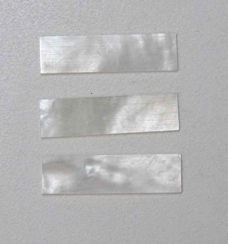 <p>White Mother of Pearl flat inlay blanks size 8.5mm (0.335" width x 30mm (1.18") length x 1mm (0.04") thickness A grade good on both sides.</p>