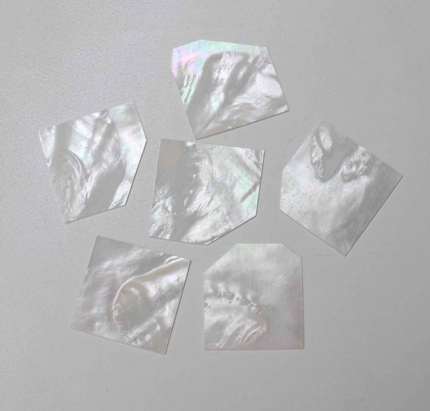 White Mother of Pearl flat inlay blanks mix size 25 - 35mm  width x 35 - 50mm length x 2.5mm (0.1") thickness A grade good on both sides