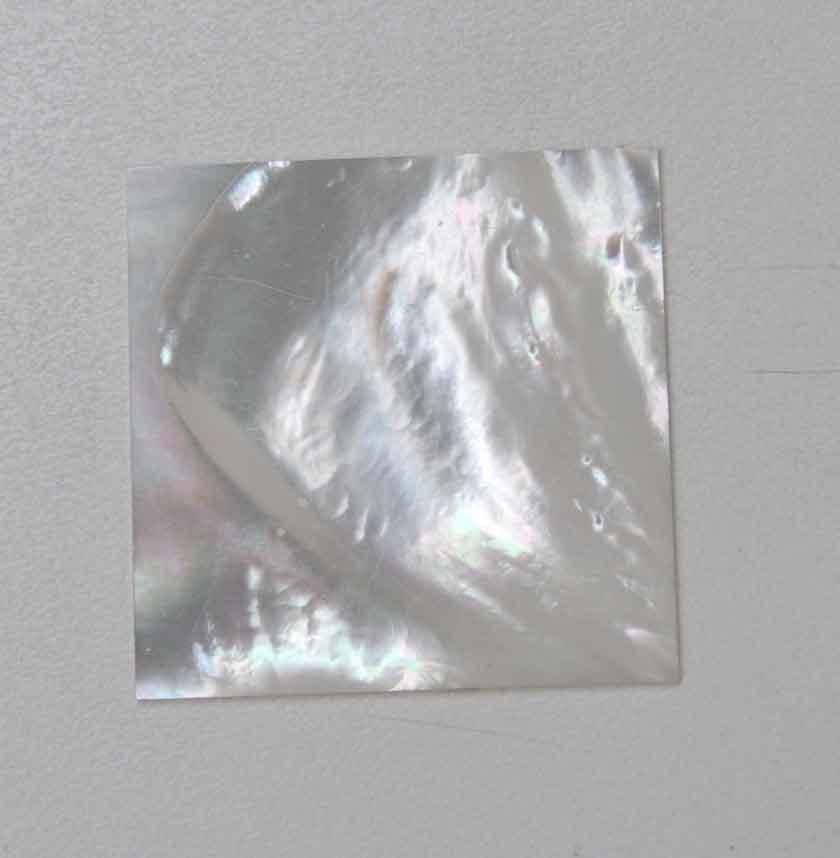 <p>White Mother of Pearl flat inlay polished 1side blanks size 50mm (1.97") width x 50mm (1.97") length x 1.5mm (0.06") thickness. A grade good on both sides.</p>