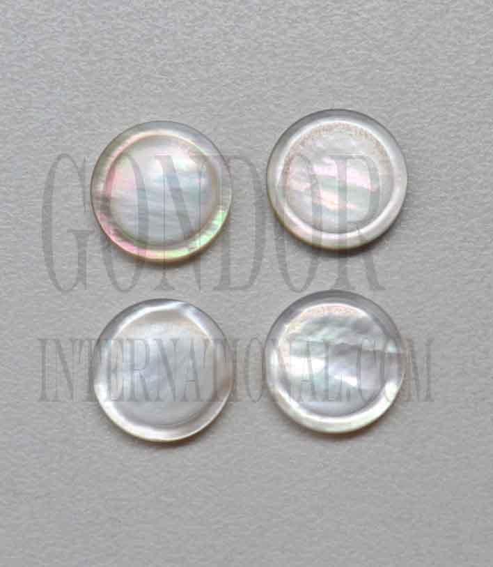 <p>White Mother of Pearl finger button inlay 15.1mm (0.594") diameter 2.6mm (0.102") thickness polished on 1 side. Ideal for use in brasswind or woodwind instruments as well as accordions and general inlay or jewellery decorations. All pcs are A grade.</p>