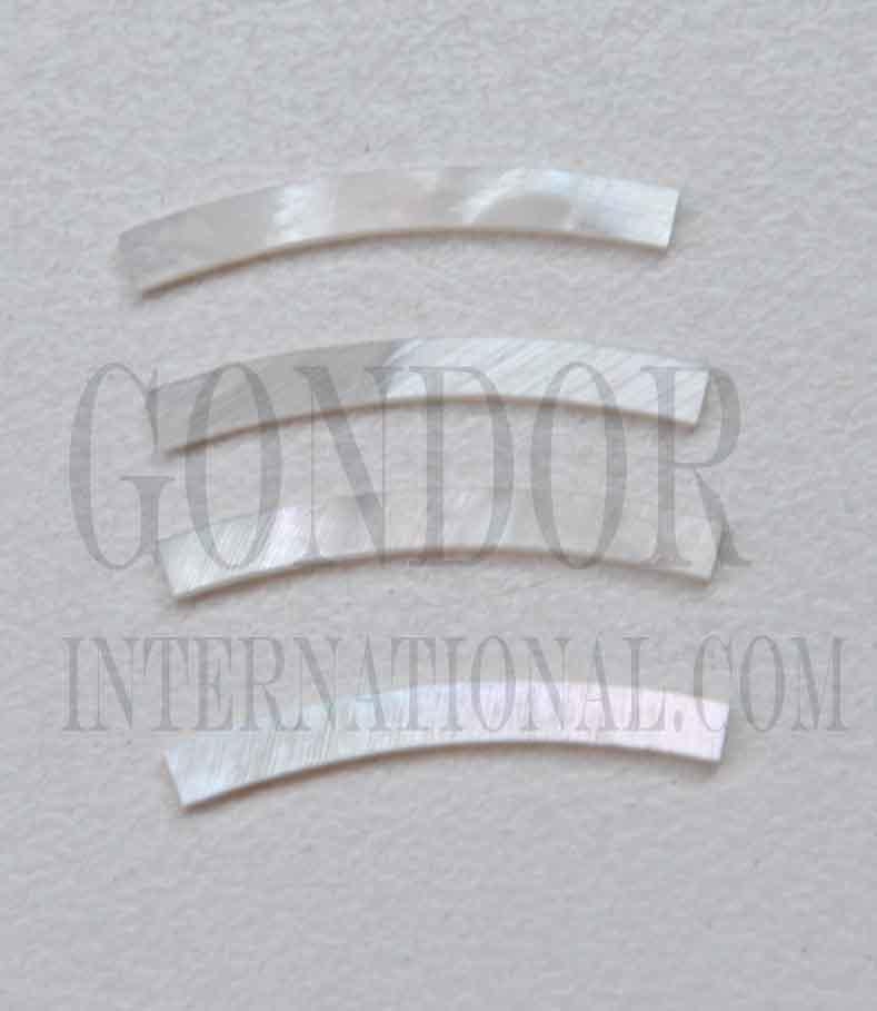 White Mother of Pearl solid shell curved strips 3.17mm (0.125") width x  25mm (1") length x 1.3mm (0.05") thickness x 76.2mm (3") inside diameter. A grade quality good on both sides, flat and uniform in thickness and width. Ideal for use in rosettes and purfling on musical instruments - Ukuleles, guitars, mandolins etc. as well as in furniture, jewellery and other decorative applications.