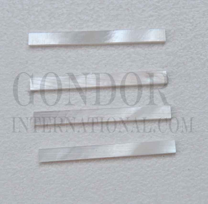 White Mother of Pearl solid shell straight strips 2.5mm (0.098") width x 25mm (1") length x 1.3mm (0.05") thickness. A grade quality good on both sides, flat and uniform in thickness and width. Ideal for use in purfling on musical instruments - Ukuleles, guitars, mandolins etc. as well as in furniture, jewellery ans other decorative applications.