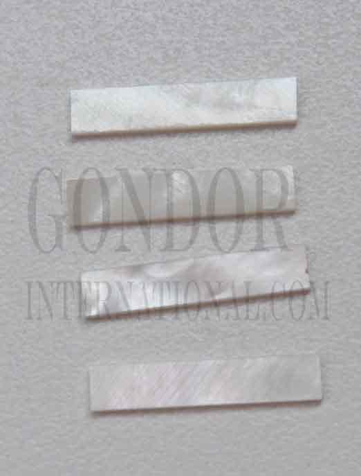 White Mother of Pearl solid shell straight strips 5mm (0.197") width x 25mm (1") length x 1.3mm (0.05") thickness. A grade quality good on both sides, flat and uniform in thickness and width. Ideal for use in purfling on musical instruments - Ukuleles, guitars, mandolins etc. as well as in furniture, jewellery ans other decorative applications.