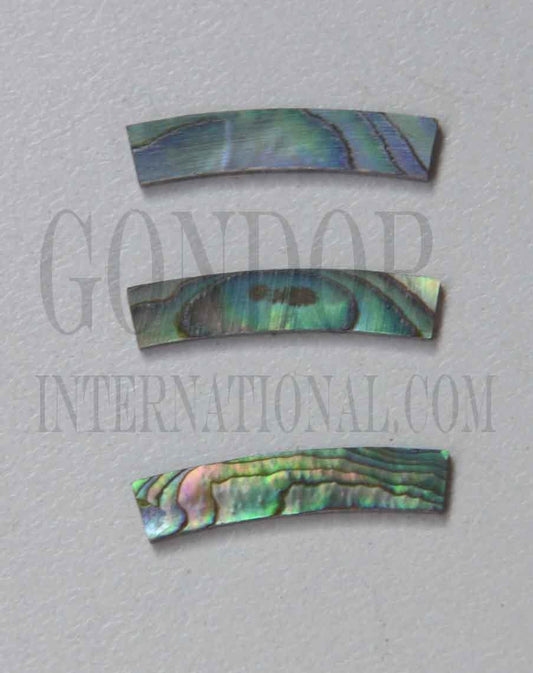 Paua abalone solid shell curved strips 4.76mm (3/16") width x 25mm (1") length x 1.3mm (0.05") thickness x 110mm (4.33") inside diameter. A grade quality good on both sides, flat and uniform in thickness and width. Ideal for use in purfling and rosettes on musical instruments - Ukuleles, guitars, mandolins etc. as well as in furniture, jewellery and other decorative applications.