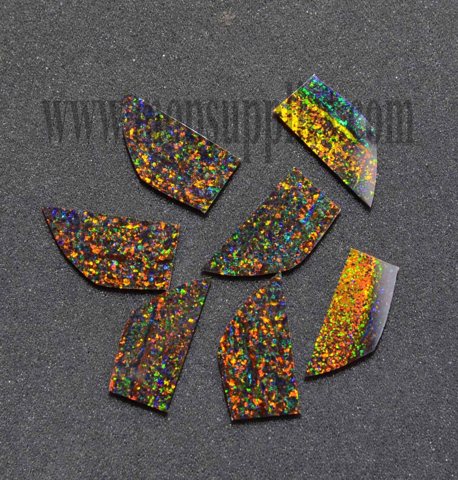 <p>Opal blanks OP34 mixed size blanks 10-15 x 15 -30mm x 1.5mm (0.06") thickness flat cut pcs polished 1 side made from manufactured opal blocks suitable for inlay jewellery, bow slides. Opal blanks can be cut same way as mother of pearl blanks and are of similar hardness.</p>