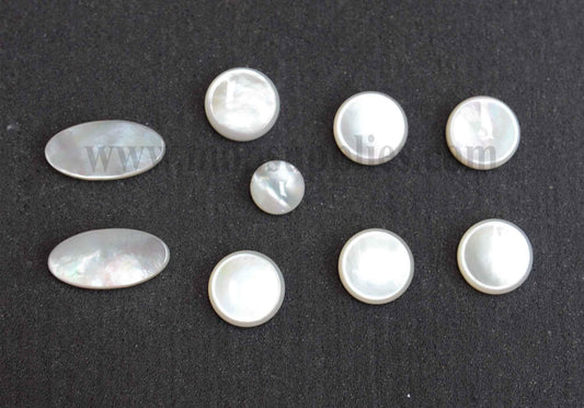 <p>White Mother of Pearl saxophone finger button inlay set 2.5mm (0.1") thickness polished on 1 side. Individual sizes Concave round button 6pcs 15.1 x 2.5mm, Convex round button 1pc&nbsp; 10.9 x 2.5mm Oval button 2pcs 11.9 x 24 x 2.5mm. All pcs are A grade.</p>