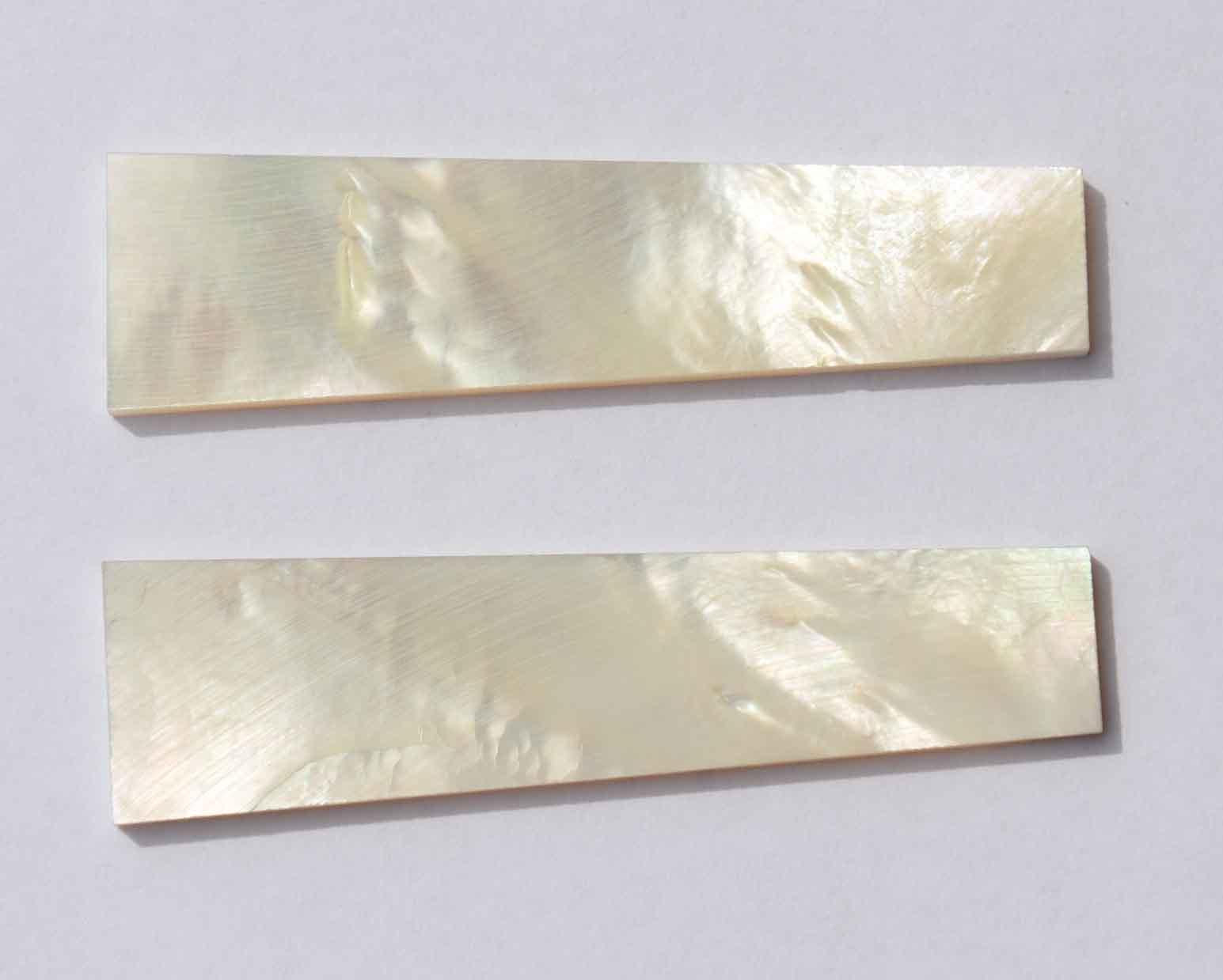 <p>White Mother of Pearl flat blanks size 14mm (0.55") width x 20mm (0.787") width x 75mm (2.95") length x 3mm (0.118") thickness A grade good on both sides.</p>