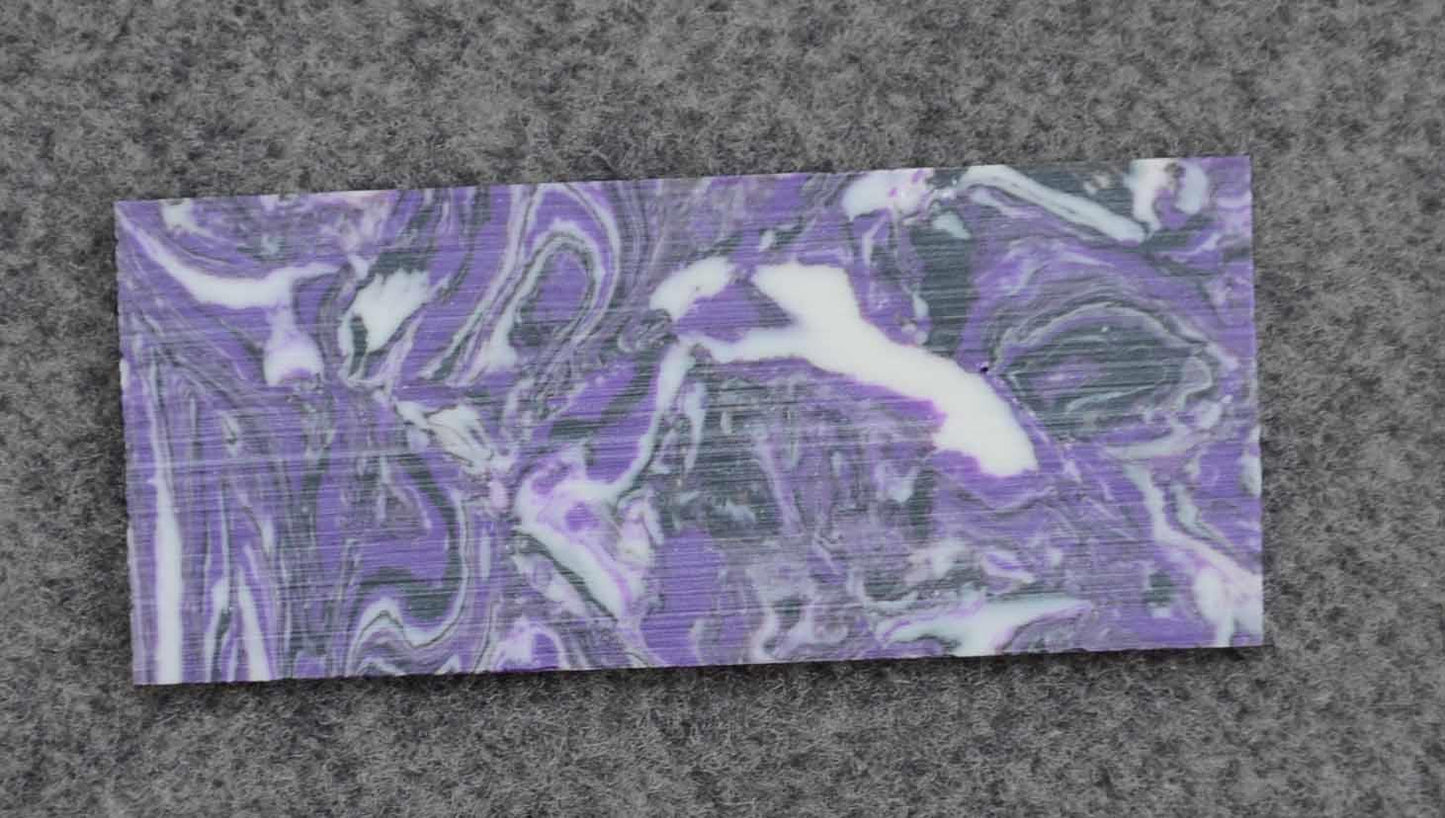 <p>Purple stone swirly CH2I4 artificial stone blanks 30x70x1.5mm suitable for inlay. Can be cut with standard cutting tools - jewellery saw similar in characteristics to mother of pearl (hardness approx. 3. Can be sanded and polished same way as shell material. All pcs are A grade good on both sides.</p>