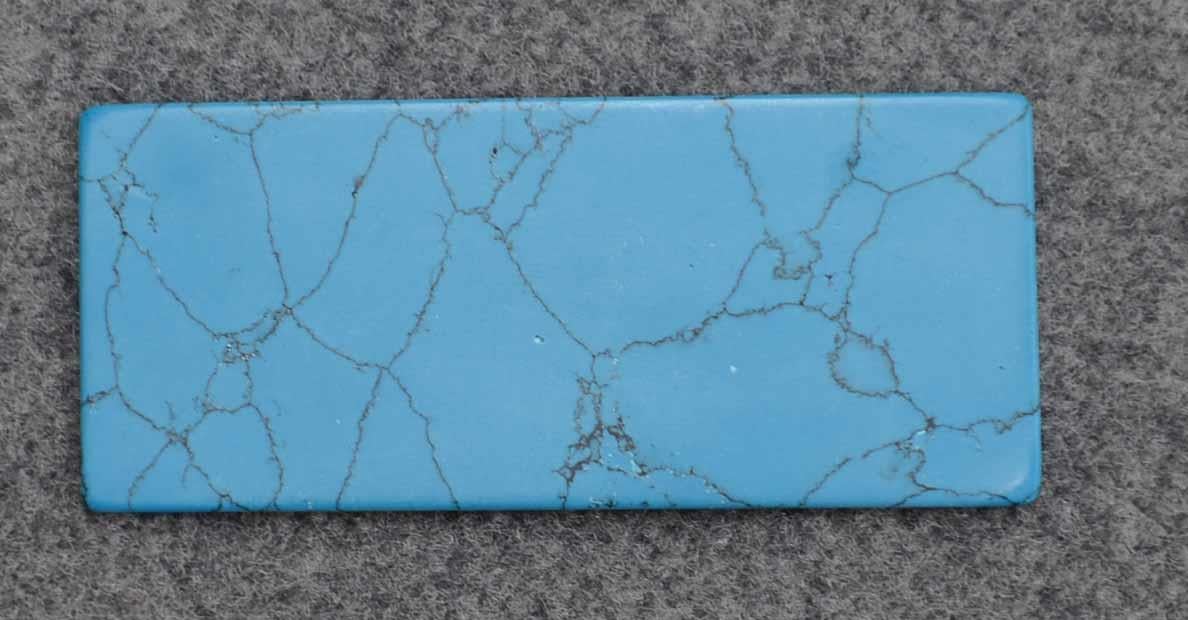 <p>Turquoise C015 artificial stone blanks 30 x 70 x 1.5mm suitable for inlay. Can be cut with standard cutting tools - jewellery saw similar in characteristics to mother of pearl (hardness approx. 3. Can be sanded and polished same way as shell material. All pcs are A grade good on both sides.</p>