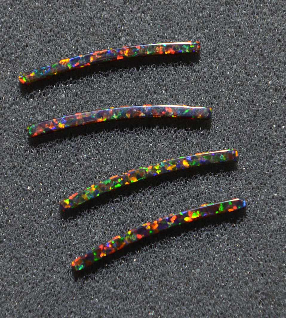 <p>Manufactured opal curved strips 1.6mm (0.063") width x 24mm (1") length x 1.3mm (0.05") thickness x 120mm (4.72") inside diameter suitable for musical instrument purfling - guitars, Ukuleles cut flat to specific dimensions.</p>