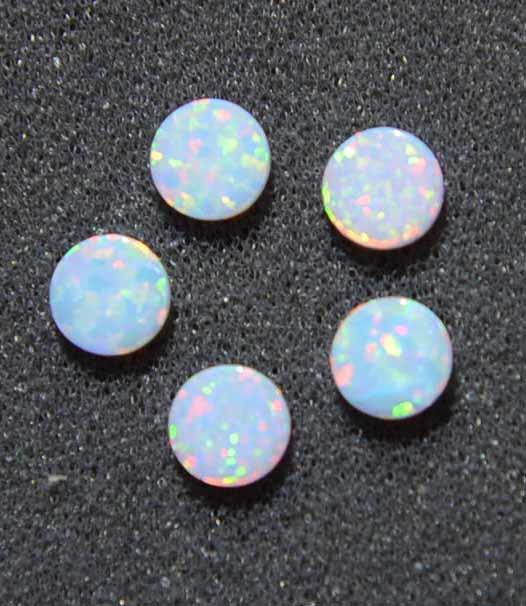 <p>Opal dots OP17 6 x 1.3mm flat pcs made to specific diameter and thickness made from manufactured opal suitable for inlay, fretboard markers, jewellery, Opal dots can be worked same way as mother of pearl and are of similar hardness.</p>