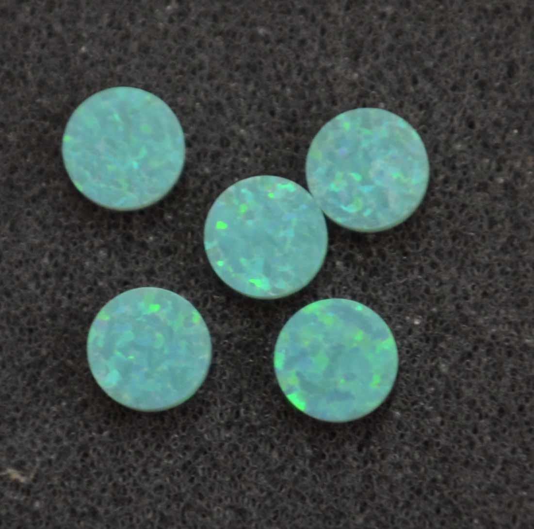 <p>Opal dots OP11 6 x 1.3mm flat pcs made to specific diameter and thickness made from manufactured opal suitable for inlay, fretboard markers, jewellery, Opal dots can be worked same way as mother of pearl and are of similar hardness.</p>