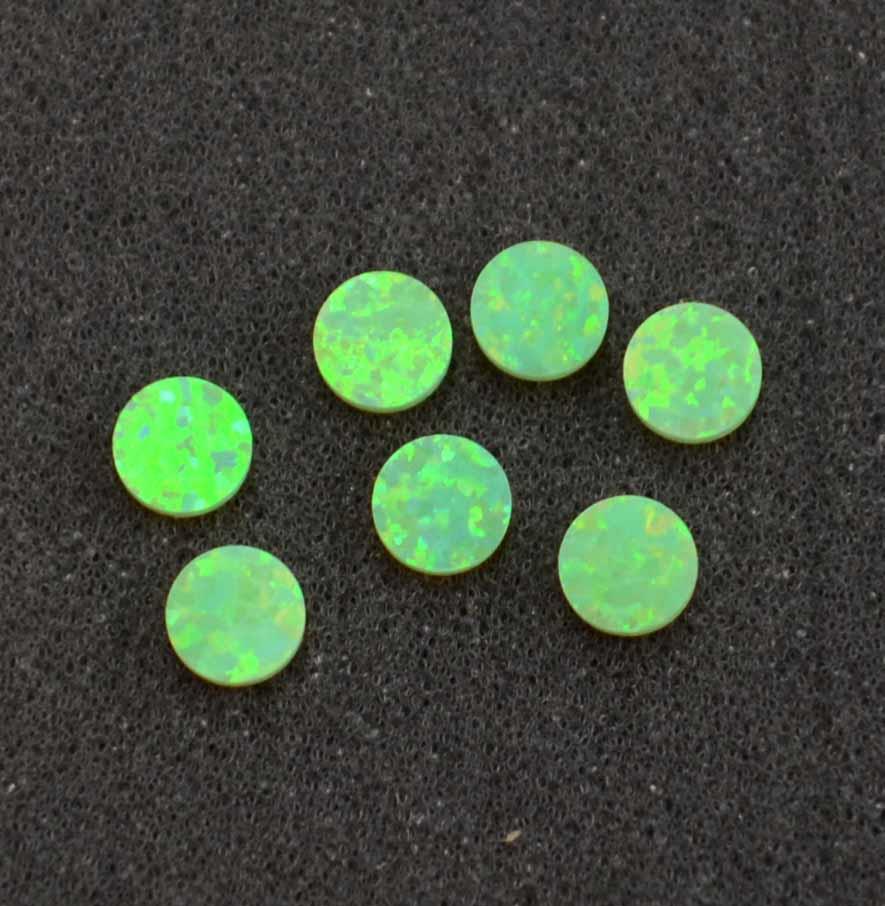 <p>Opal dots OP68 5 x 1.3mm flat pcs made to specific diameter and thickness made from manufactured opal suitable for inlay, fingerboard markers, jewellery, Opal dots can be worked same way as mother of pearl and are of similar hardness.</p>