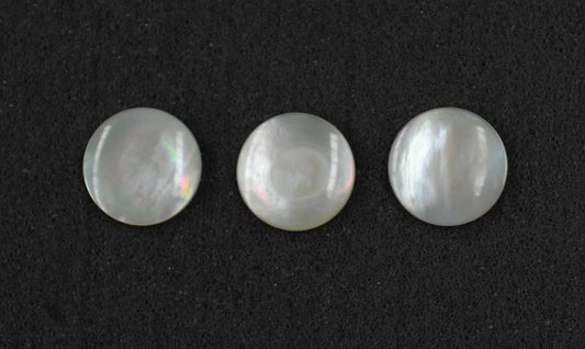 White Mother of Pearl domed finger button inlay 14.5mm diameter 2mm thickness polished on 1 side round pcs Ideal for use in brasswind or woodwind instruments as well as accordions and general inlay or jewellery decorations. All pcs are A grade.