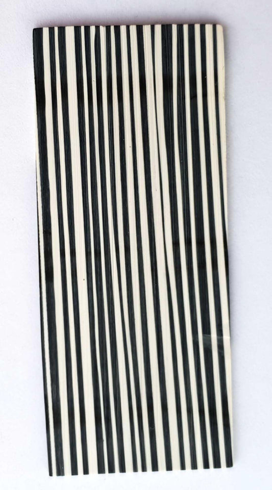 <p>Stripe stone CH2H2&nbsp; reconstituted stone blanks 30 x 70 x 1.5mm suitable for inlay. Can be cut with standard cutting tools - jewellery saw similar in characteristics to mother of pearl (hardness approx. 3. Can be sanded and polished same way as shell material. All pcs are A grade good on both sides.</p>