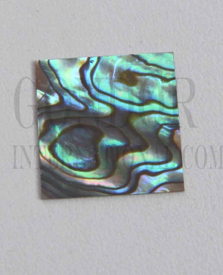 <p>Paua abalone (New Zealand Paua shell) flat inlay blanks polished 1 side size 25mm (1") width x 25mm (1") length x 1.3mm (0.05") thickness</p>