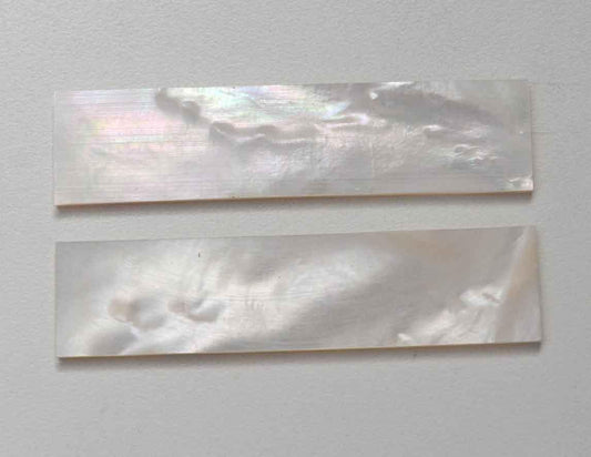 <p>White Mother of Pearl flat inlay blanks size 25.4mm (1.04") width x 63.5mm (2.59") length x 2mm (0.08") thickness A grade clean on both sides.</p>