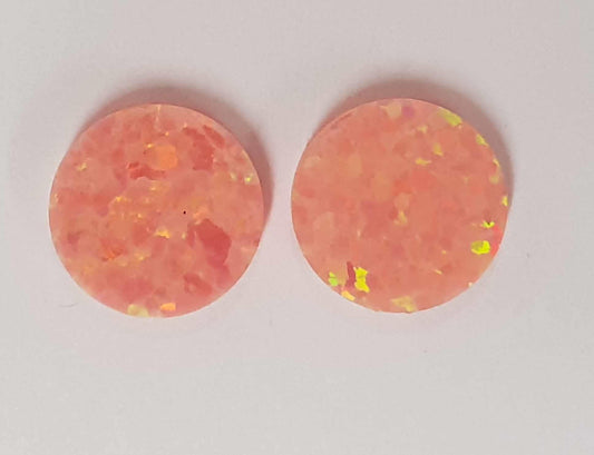 <p>Opal dots OP24 10 x 1.3mm flat pcs made to specific diameter and thickness made from manufactured opal suitable for inlay, fretboard markers, jewellery, Opal dots can be worked same way as mother of pearl and are of similar hardness.</p>