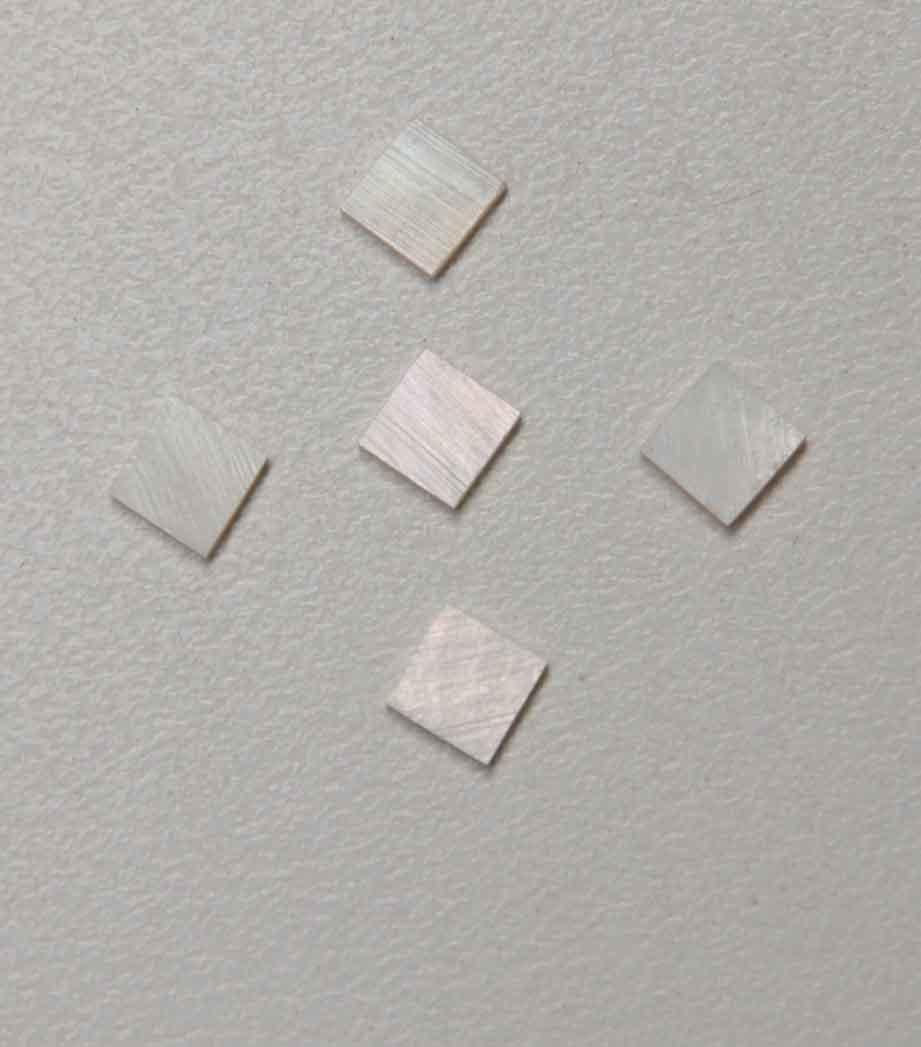 <p>White Mother of Pearl flat inlay blanks size 1mm (0.04") width x 1mm (0.04") length x 1.3mm (0.05") thickness A grade good on both sides.</p>