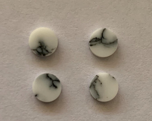 <p>Marble Cremona HOWLITE3 dots 6mm diameter x 1.5mm thickness - round flat pcs cut to precise diameter and thickness. Ideal for use in inlay applications - for fretboard markers, and general inlay or jewellery decorations. All dots are A grade good on both sides.</p>