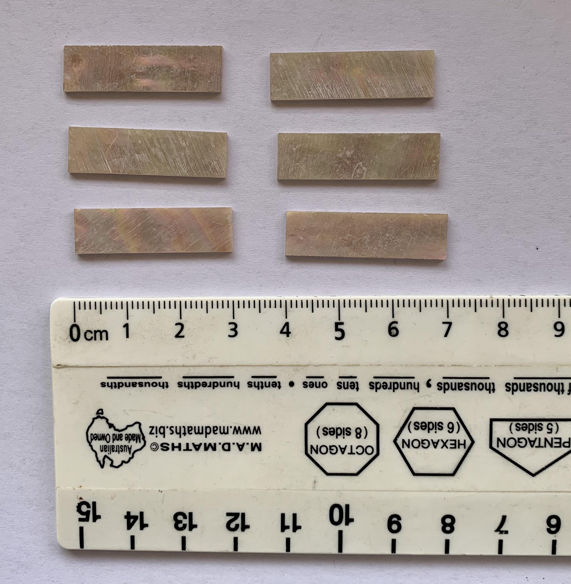 Awabi flat inlay blanks 8x30x0.5mm A grade -good on both sides - no holes or worm damage. Also used as Awabi (Goldfish) bow slides for violin.