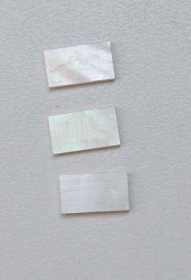 <p>White Mother of Pearl flat inlay blanks size 7.5mm (0.295" width x 30mm (1.18") length x 1mm (0.04") thickness A grade good on both sides.</p>