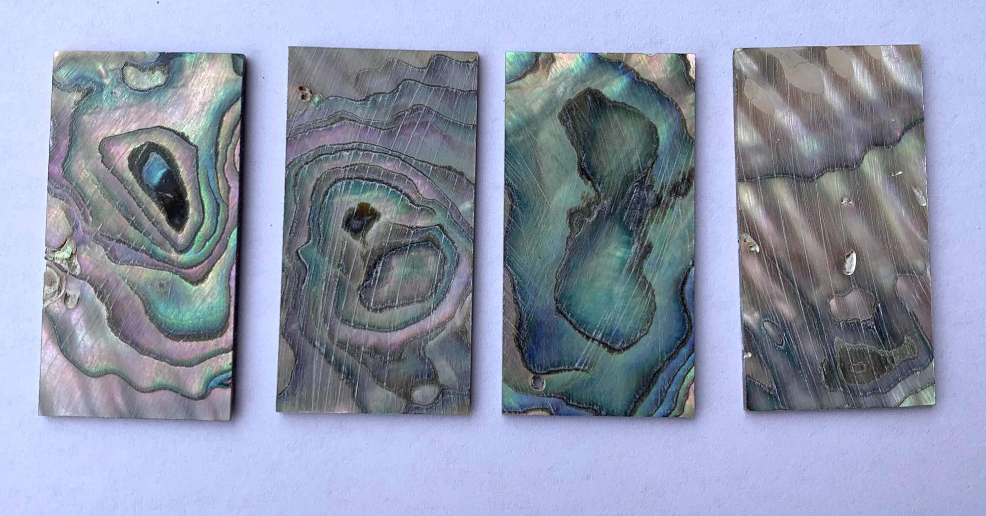 <p>Green abalone (Mexican green abalone) flat inlay blanks size 22mm (0.866") width x 42mm (1.65") length x 1.3mm (0.05") thickness B grade.</p>