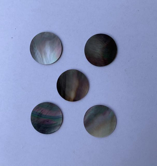 Black Mother of Pearl shell dots 25mm diameter 1mm thickness polished on 2 sides round flat shell pcs cut to precise diameter and thickness. Ideal for use in watch dials, inlay applications jewellery decorations. All pcs are A grade.