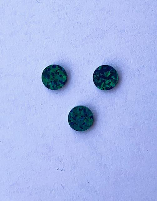 <p>Opal dots OP19 5 x 1.3mm flat pcs made to specific diameter and thickness made from manufactured opal suitable for inlay, fretboard markers, jewellery, Opal dots can be worked same way as mother of pearl and are of similar hardness.</p>