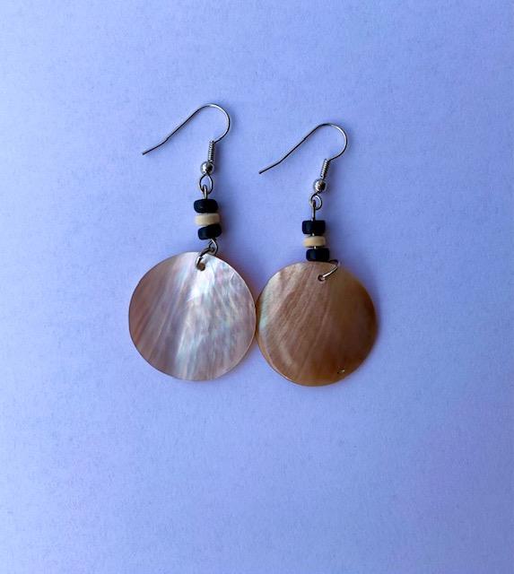 <p>Genuine shell earrings, made from real mother of pearl shells. Beautiful present for a special someone or to spoil yourself. Each set of earrings are handmade.</p>