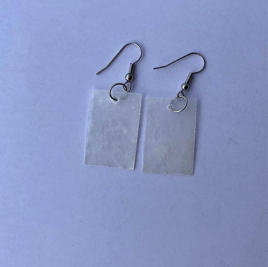 <p>Genuine shell earrings, made from real mother of pearl shells. Beautiful present for a special someone or to spoil yourself. Each set of earrings are handmade.</p>