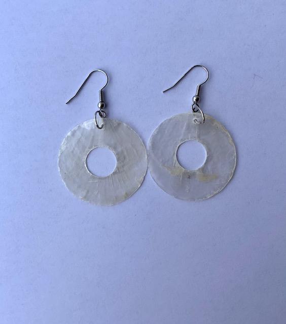 <p>Genuine shell earrings, made from real mother of pearl shells. Beautiful present for a special someone or to spoil yourself. Each set of earrings are handmade.</p>