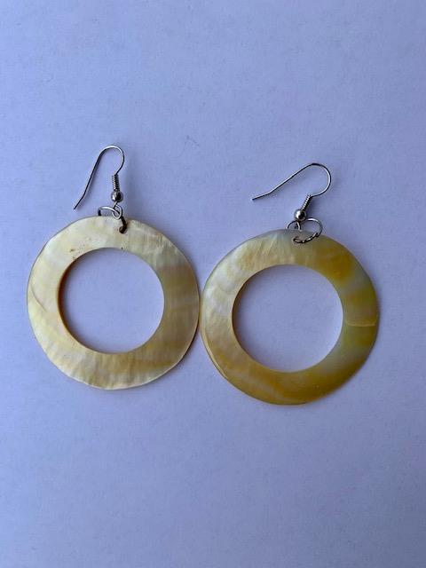 <p>Genuine shell earrings, made from real mother of pearl shells. Beautiful present for a special someone or to spoil yourself. Each set of earrings are handmade.</p>