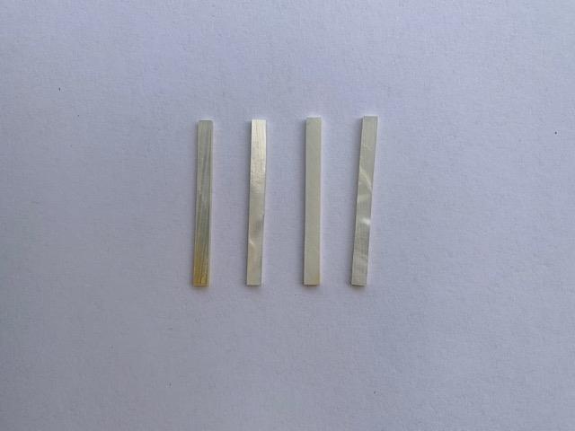 <p>White Mother of Pearl flat inlay blanks size 5mm (0.2") width x 5mm (0.2") length x 1mm (0.04") thickness. A grade good on both sides.</p>