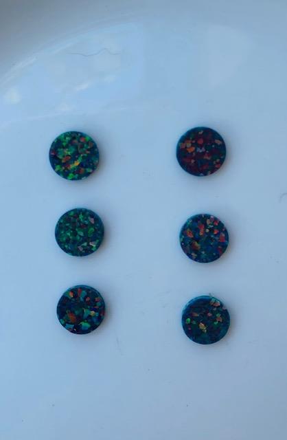 <p>Opal dots OP29 9 x 1.3mm flat pcs made to specific diameter and thickness made from manufactured opal suitable for inlay, fretboard markers, jewellery, Opal dots can be worked same way as mother of pearl and are of similar hardness.</p>