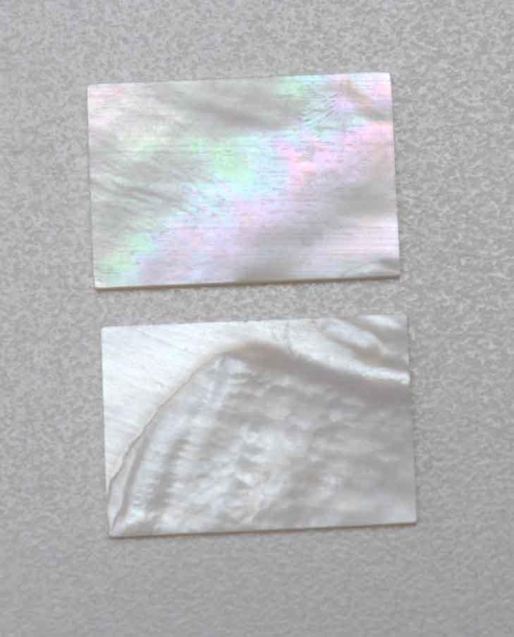 <p>White Mother of Pearl flat inlay blanks size 35mm (1.38") width x 50mm (1.97") length x 1.5mm (0.06") thickness A grade good on both sides.</p>