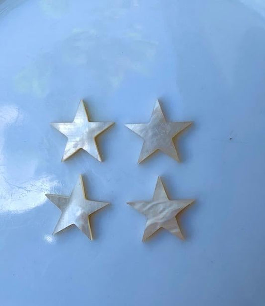 <p>White Mother of Pearl 5 point stars size 17mm (0.7") square x 1.5mm (0.06") thickness. Some uses include fretboard markers, musical instrument inlay, furniture inlay, marquetry, pool cue inlay and other general decorative inlay and jewellery applications. All pcs are A grade.</p>