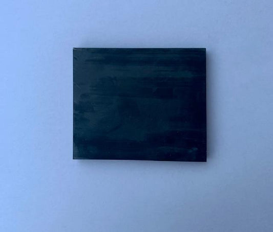 <p>Black stone reconstituted stone blanks 60 x 70 x 7mm suitable for inlay. Can be cut with standard cutting tools - jewellery saw similar in characteristics to mother of pearl (hardness approx. 3. Can be sanded and polished same way as shell material.</p>