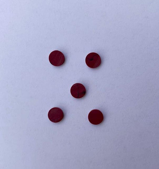 <p>Bloody Jasper SJASPER reconstituted stone dots 9 x 1.3mm suitable for inlay. Can be cut with standard cutting tools - jewellery saw similar in characteristics to mother of pearl (hardness approx. 3. Can be sanded and polished same way as shell material. All pcs are A grade good on both sides.</p>