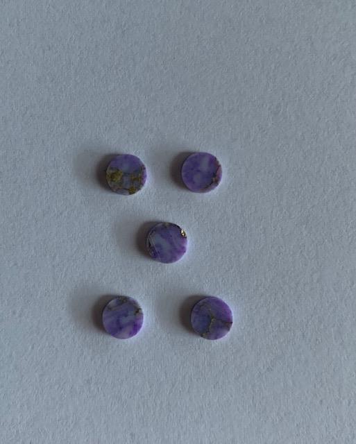 <p>Amethyst CHAR7 dots 10mm diameter x 1.3mm thickness - round flat pcs cut to precise diameter and thickness. Ideal for use in inlay applications - for fretboard markers, and general inlay or jewellery decorations. All dots are A grade good on both sides.</p>