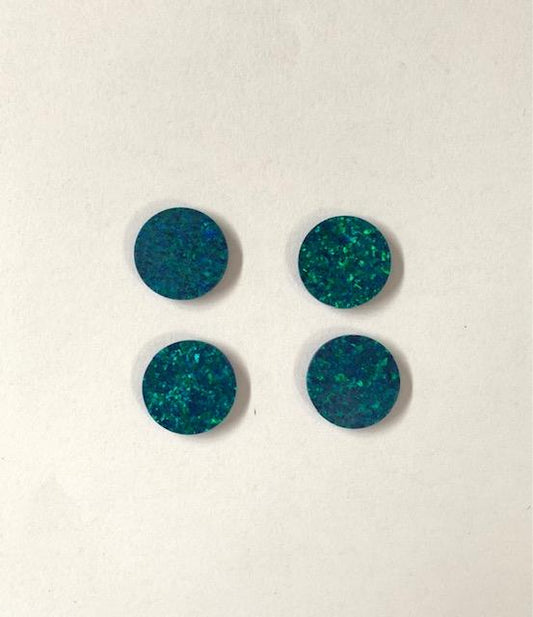 <p>Opal dots OP19 14 x 1.5mm flat pcs made to specific diameter and thickness made from manufactured opal suitable for inlay, fretboard markers, jewellery, Opal dots can be worked same way as mother of pearl and are of similar hardness.</p>