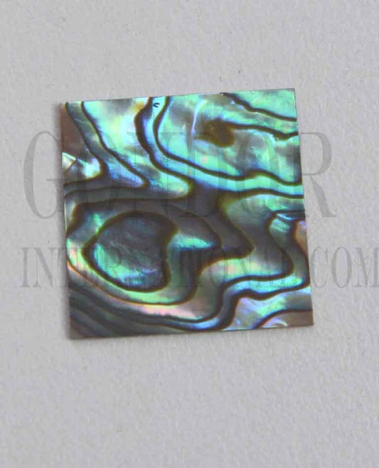 <p>Paua abalone (New Zealand Paua shell) flat inlay blanks size 25mm (1") width x 25mm (1") length x 1.5mm (0.06") thickness A grade good on both sides.</p>