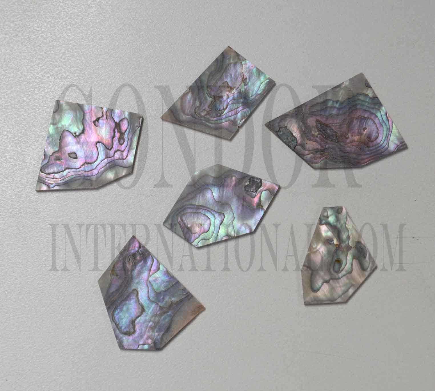 <p>Pink abalone flat inlay blanks mix size approx. 15-25mm (0.6 - 1") width x 15 - 35mm (0.6 - 1.38") length x 1mm (0.04) thickness A grade.</p>