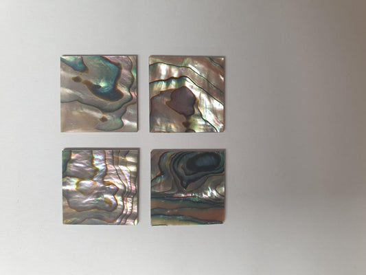 <p>Green abalone (Mexican green abalone) flat inlay blanks polished 1 side size 25mm (1") width x 25mm (1") length x 1.3mm (0.005") thickness A grade.</p>