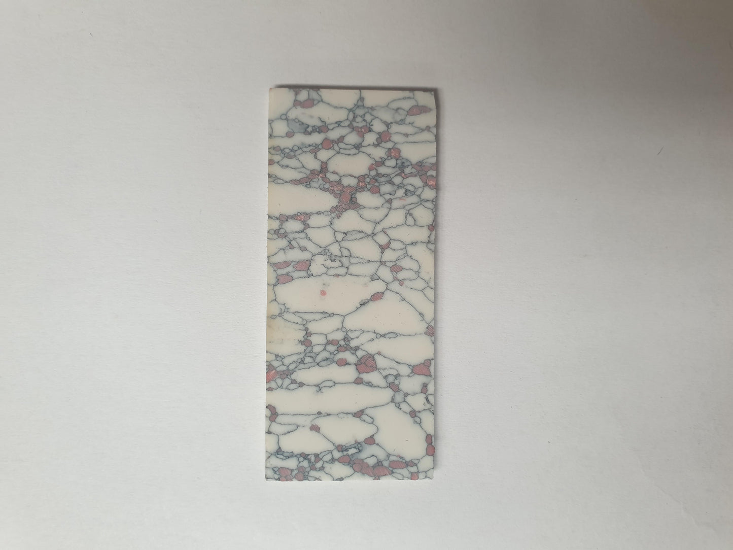 <p>Marble Bohemian CH2E6 reconstituted stone blanks 30 x 70 x 1.5mm suitable for inlay. Can be cut with standard cutting tools - jewellery saw similar in characteristics to mother of pearl (hardness approx. 3. Can be sanded and polished same way as shell material. All pcs are A grade good on both sides.</p>