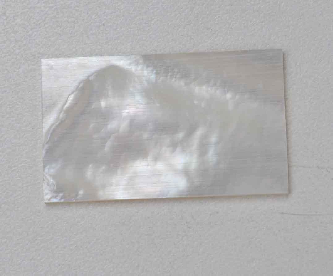 <p>White Mother of Pearl flat inlay blanks size 30mm (1.18") width x 55mm (2.16") length x 3.5mm (0.14") thickness A grade good on both sides.</p>