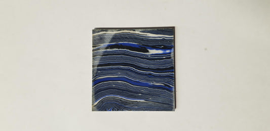 <p>Dark Blue Agate M110 reconstituted stone blanks 50 x 50 x 2mm&nbsp; suitable for inlay. Can be cut with standard cutting tools - jewellery saw similar in characteristics to mother of pearl (hardness approx. 3. Can be sanded and polished same way as shell material. All pcs are A grade good on both sides.</p>