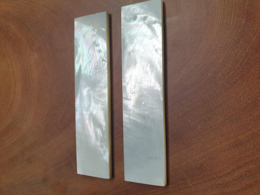 <p>White Mother of Pearl flat inlay blanks size 22mm (0.866") width x 90mm (3.54") length x 3.5mm (0.14") thickness A grade clean on both sides.</p>