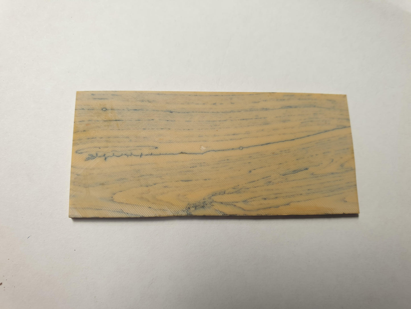 <p>Yellow Stone reconstituted stone blanks 30 x 70 x 1.5mm suitable for inlay. Can be cut with standard cutting tools - jewellery saw similar in characteristics to mother of pearl (hardness approx. 3. Can be sanded and polished same way as shell material. All pcs are A grade good on both sides.</p>